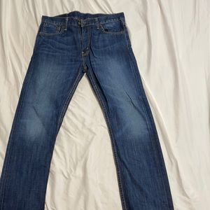 Levi 513 medium wash jeans / 33x30 / red tag